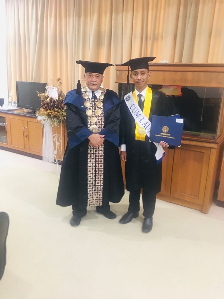 Amran bersama Rektor UNY. Foto: Dok. Pribadi.