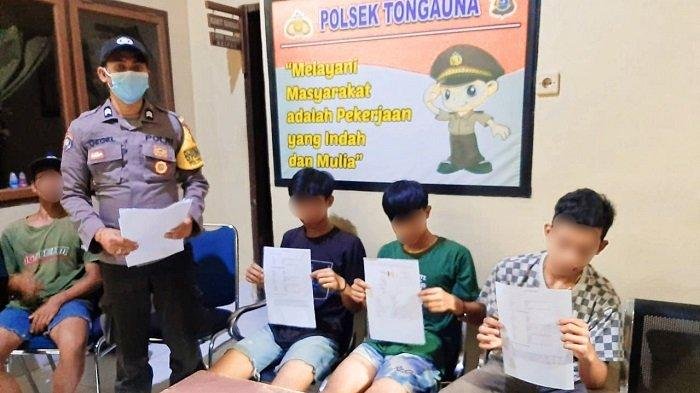 Tiga pelaku dan korban menunjukkan surat pernyataan agar tidak mengulangi hal yang sama.