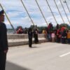 HUT ke-77 RI, Bendera Merah Putih Sepanjang 770 Meter Berkibar di Jembatan Teluk Kendari