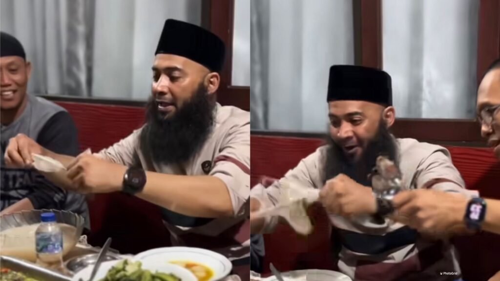Ustaz Syafiq Riza Basalamah saat mencicipi sinonggi di Kendari.
