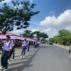 Semarakan HUT ke-78 RI, Ribuan Pelajar di Kendari Bentangkan Bendera Sepanjang 17 Km