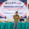 Wakil Ketua Komisi II DPR RI Bahtra Kawal Penyerahan Sertifikat PTSL Warga Watubangga Kendari