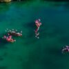 Peringati Indonesia Merdeka, Warga Muna Bentangkan Bendera Merah Putih 50 Meter di Danau Napabale