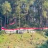 Merah Putih Sepanjang 300 Meter Membentang di Hutan Pinus Baini Konawe